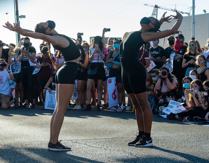 (Rick Egan  |  The Salt Lake Tribune)     Ballet West dancers Chelsea Keefer and Jazz Bynum perform a special dance on State Street in Salt Lake City, during the Dance Dance Revolution protest for racial equality, on Sunday, Aug. 9, 2020.