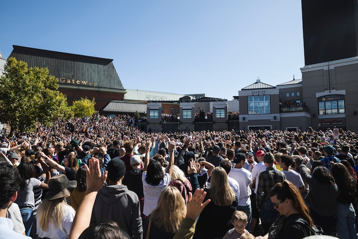 (Clark Clifford  |  Special to The Salt Lake Tribune) Thousands cram into Olympic Plaza surrounding Kanye West during his Sunday Service at The Gateway in Salt Lake City on Saturday, Oct. 5, 2019.