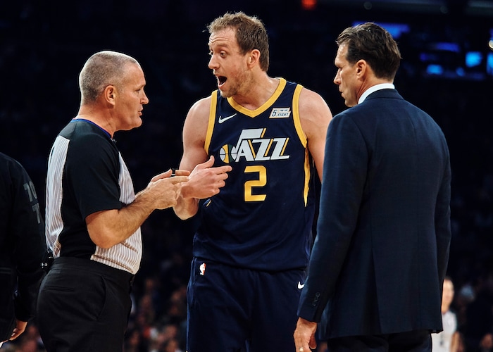 Utah Jazz's Joe Ingles, centre, complains to a referee, left, during the first half of an NBA basketball game against New York Knicks at Madison Square Garden in New York, Wednesday, Nov. 15, 2017. (AP Photo/Andres Kudacki)