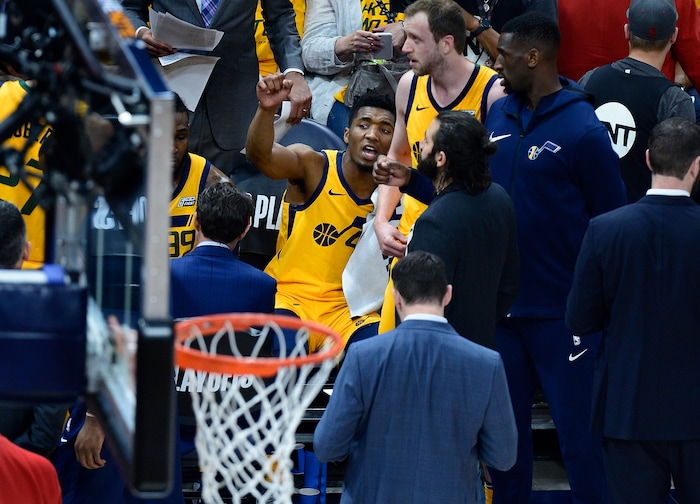 (Scott Sommerdorf | The Salt Lake Tribune)
Utah Jazz guard Donovan Mitchell (45) talk with team mates after a time out during first half play. The Rockets led the Jazz 58-48 at the half, Sunday, May 6, 2018.