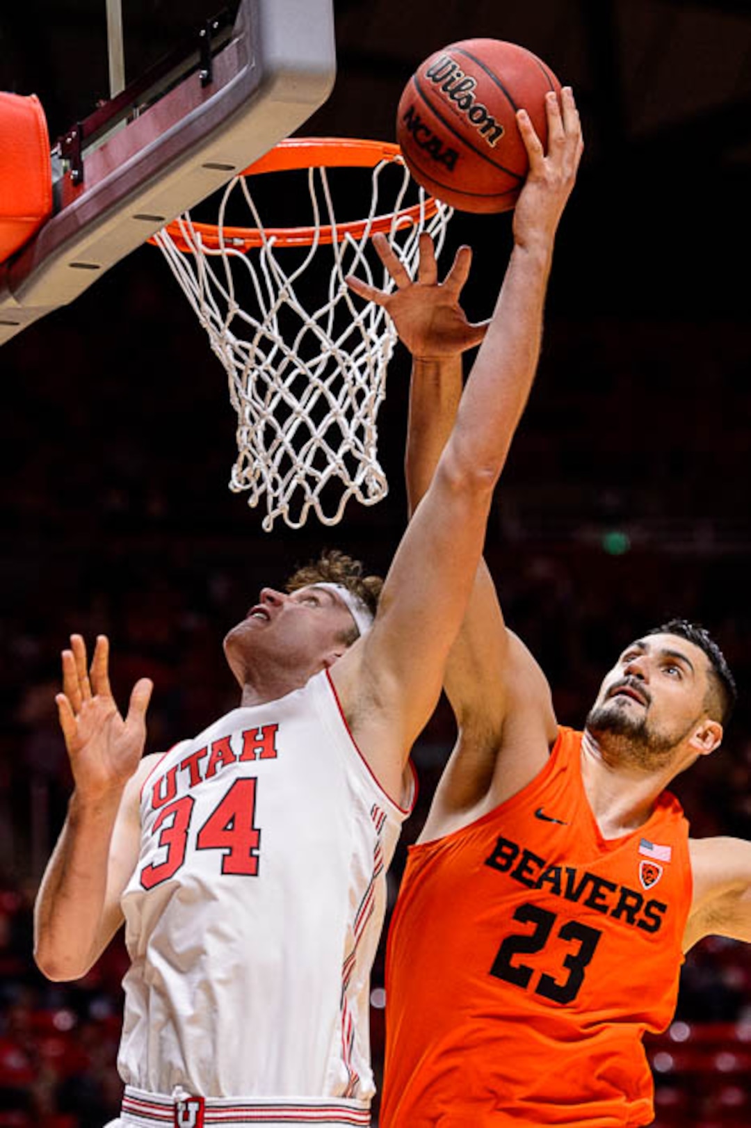 (Trent Nelson | The Salt Lake Tribune)  Utah Utes center Jayce Johnson (34) shoots, defended by Oregon State Beavers center Gligorije Rakocevic (23) as Utah hosts Oregon State, NCAA basketball in Salt Lake City on Saturday Feb. 2, 2019.