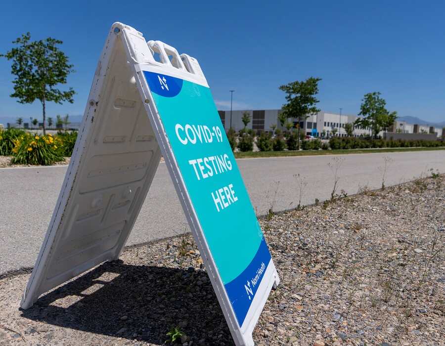 (Leah Hogsten | The Salt Lake Tribune) The Nomi Health COVID-19 testing site in the parking lot of Amazon Friday, June 10, 2022 in Salt Lake City. Thirteen more Utahns died of COVID-19 in the past week as case counts and hospitalizations throughout the state declined.