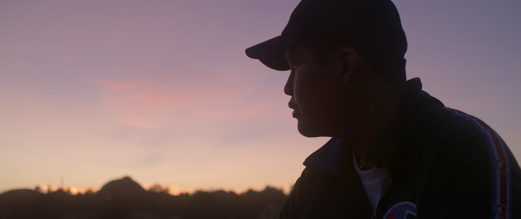 (Sorø Films) Granite Sloan, a freshman at Navajo Mountain High School, looks out over the landscape in "Scenes from the Glittering World," a new 80-minute documentary film.