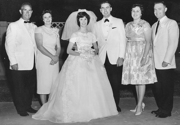 (The Church of Jesus Christ of Latter-day Saints) Jeffrey R. Holland and Patricia Terry with family at their wedding in 1963.