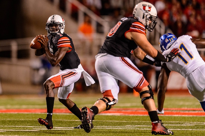 (Trent Nelson | The Salt Lake Tribune) Utah Utes quarterback Tyler Huntley (1) looks to pass as the Utah Utes host the San Jose State Spartans, NCAA football at Rice-Eccles Stadium in Salt Lake City, Saturday September 16, 2017.