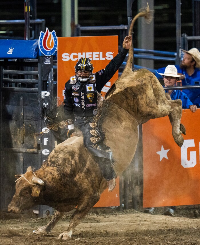 (Rick Egan | The Salt Lake Tribune)  Ednei Caminhas of Brazil, competes in the bull riding event at the Utah Days of '47 Rodeo at the State Fairpark, on Monday, July 25, 2022.