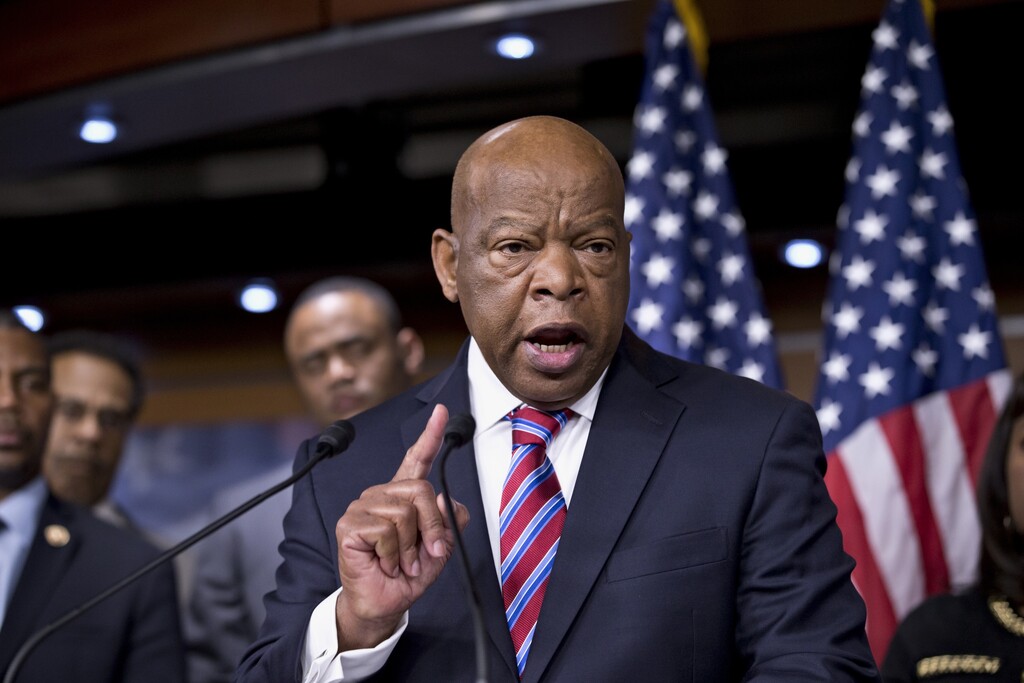 (J. Scott Applewhite | The Associated Press) In this June 25, 2013 file photo, Rep. John Lewis, D-Ga., accompanied by fellow members of the Congressional Black Caucus express disappointment in the Supreme Court's decision on Shelby County v. Holder that invalidates Section 4 of the Voting Rights Act, on Capitol Hill in Washington. Lewis worked for racial equality in Mississippi and across the South in the 1960s, and has been a U.S. congressman from Georgia since 1986. He returns to Mississippi Friday, Feb. 23, 2018, and is one of five people being honored for advancing civil rights.
