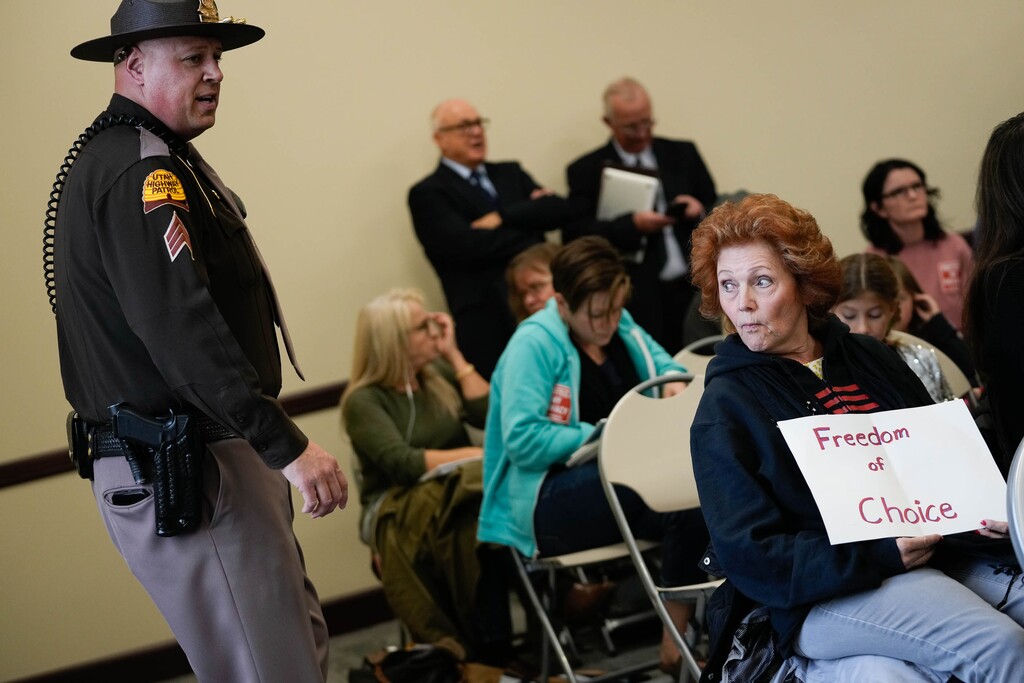 (Francisco Kjolseth | The Salt Lake Tribune) People fill the room and several overflow rooms as the Business and Labor interim committee discusses a bill about vaccine mandates by the Biden administration at the Utah State Capitol on Tuesday, Nov. 9, 2021.
