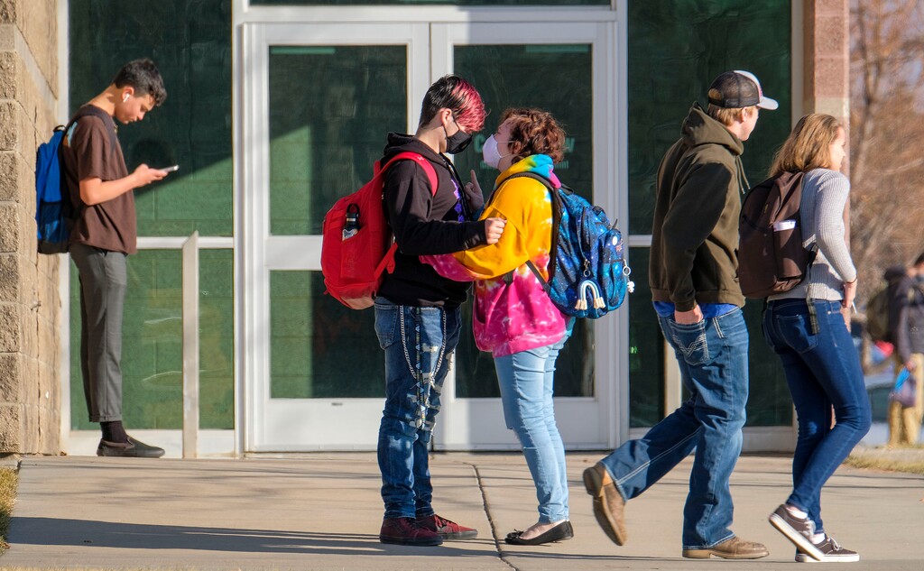 (Leah Hogsten  |  The Salt Lake Tribune) Syracuse High School students file out of school on Monday. The Davis School District tried to avoid its second two-week shutdown due to COVID cases by administering rapid antigen tests to students and teachers, December 7, 2020. The school needed at least 80% of students to agree to the tests to stay open, but only 68% participated.