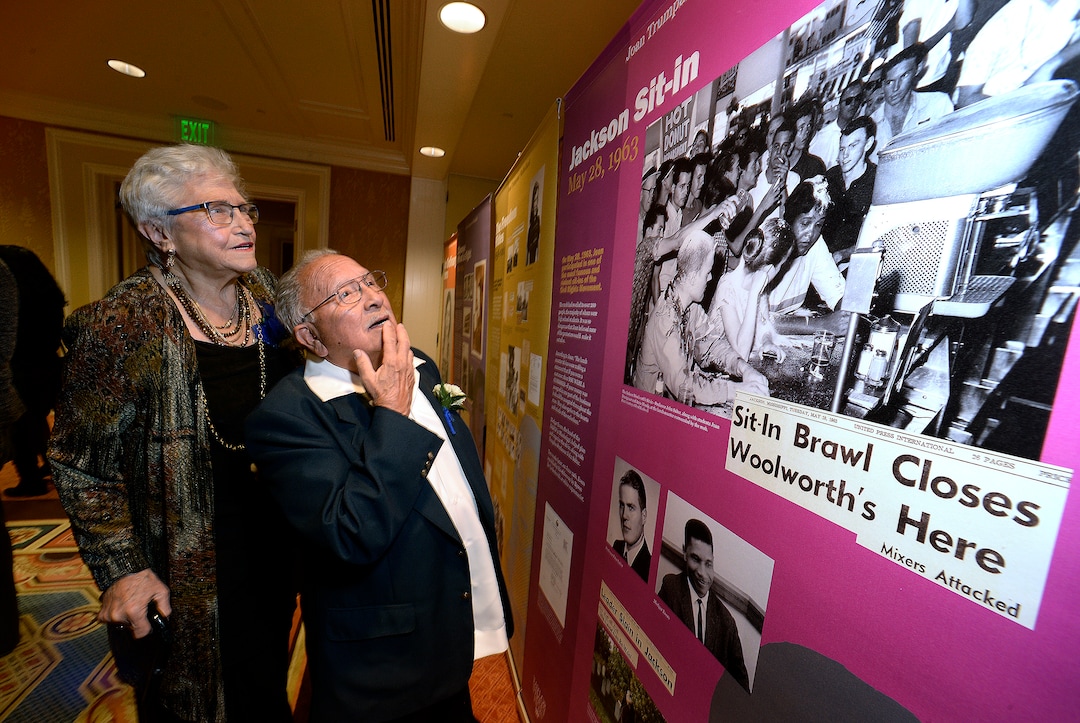 (Scott Sommerdorf  |  The Salt Lake Tribune)   
Latino activist and civil-rights advocate Robert "Archie" Archuleta and his wife, Lois Archuleta, look over some of the historical photos showing the life of "Freedom Rider" Joan Trumpauer Mulholland. Mulholland was the featured speaker during the NAACP Salt Lake City branch's Freedom Fund Banquet on Friday. Archie Archuleta was honored with the Albert Fritz Civil Rights Worker of the Year Award.