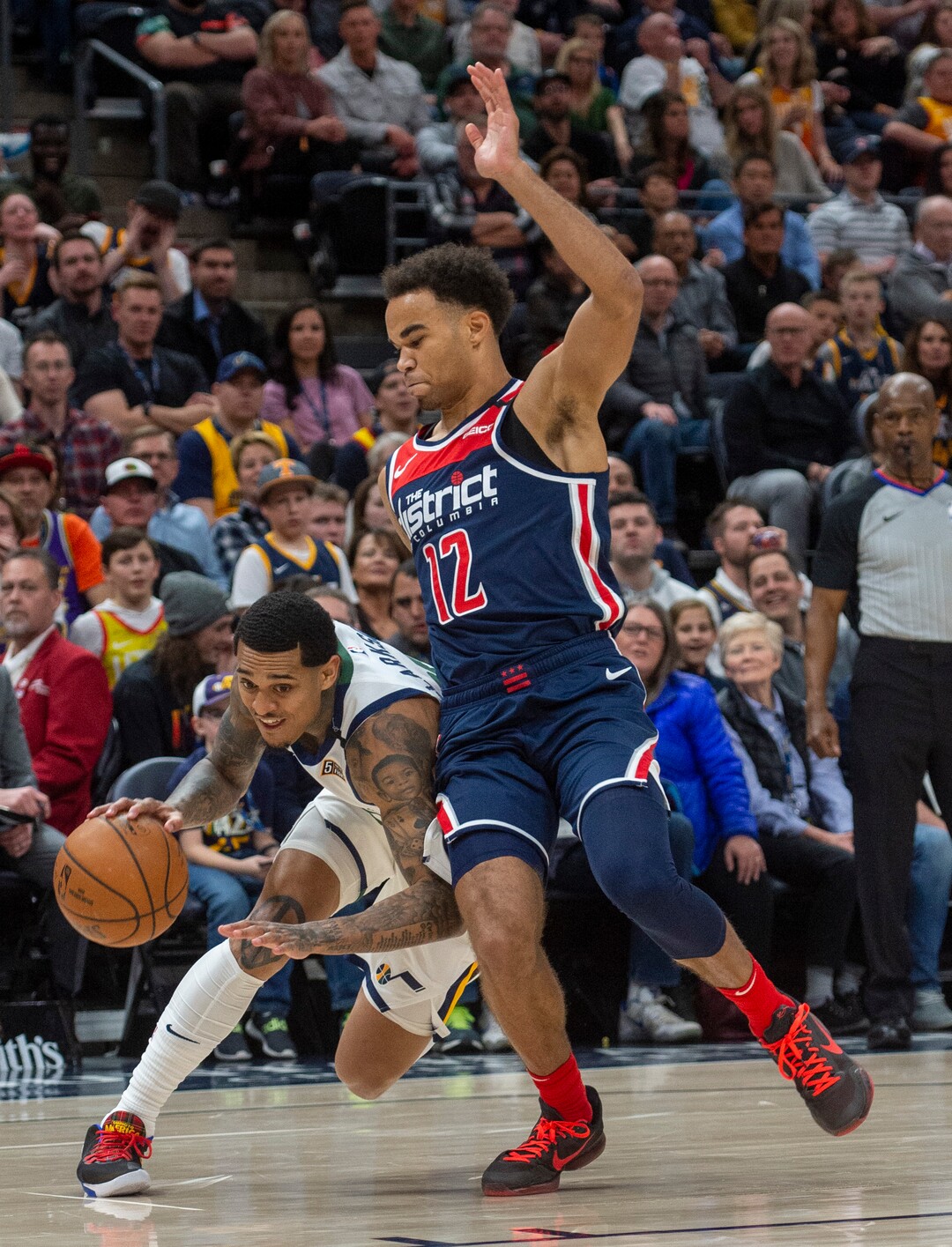(Rick Egan  |  The Salt Lake Tribune)     Utah Jazz guard Jordan Clarkson (00) tries to get by Washington Wizards guard Jerome Robinson (12), in NBA action between the Utah Jazz and the Washington Wizards, in Salt Lake City, Friday, February 28, 2020