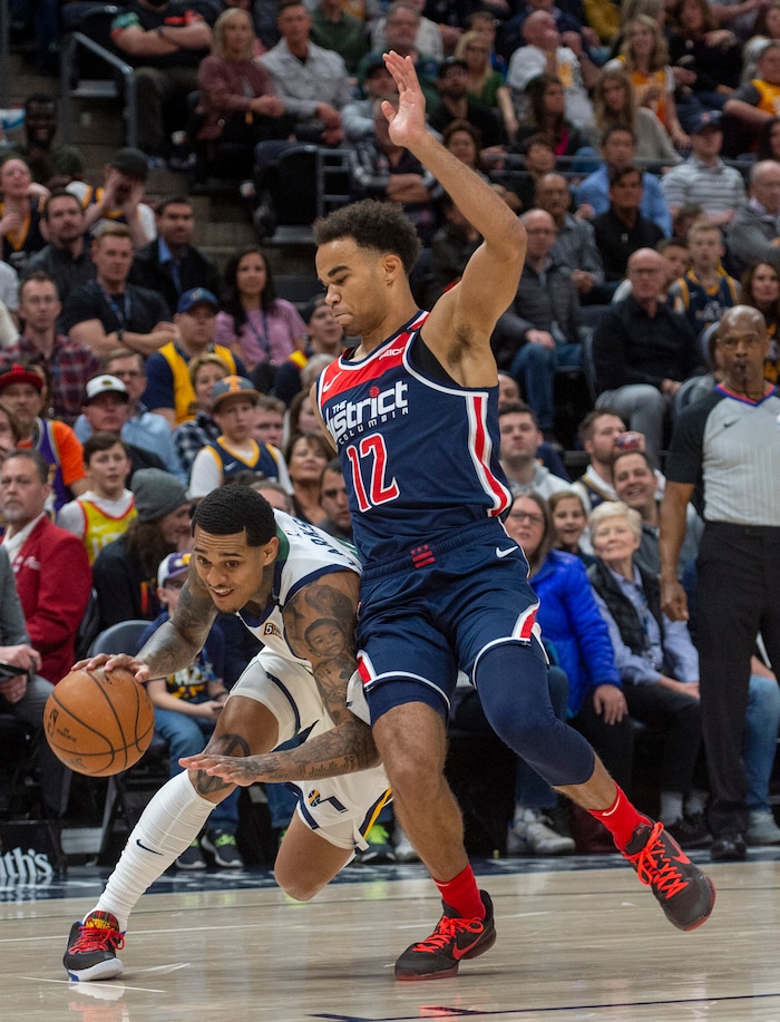 (Rick Egan  |  The Salt Lake Tribune)     Utah Jazz guard Jordan Clarkson (00) tries to get by Washington Wizards guard Jerome Robinson (12), in NBA action between the Utah Jazz and the Washington Wizards, in Salt Lake City, Friday, February 28, 2020