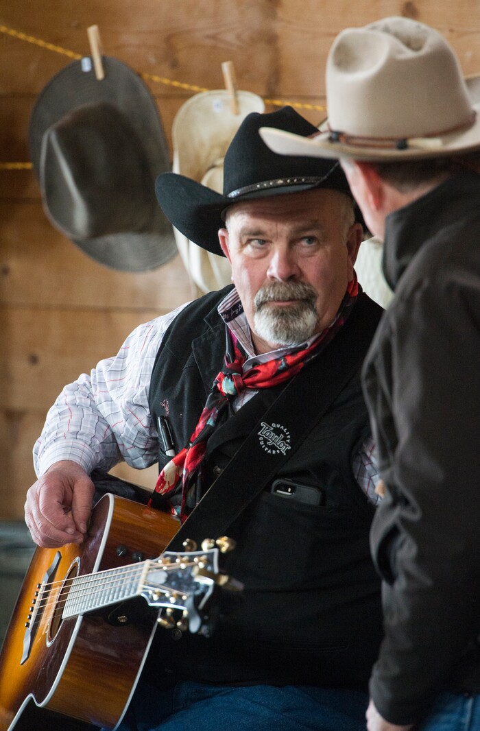 (Rick Egan  |  The Salt Lake Tribune)   Ellie Chris Mortensen chats with a friend at the 13th Annual Cowboy Legends, Music & Poetry Festival at the Historic Fielding Garr Ranch on Antelope Island, Sunday, May 27, 2018. The Festival continues through Monday.