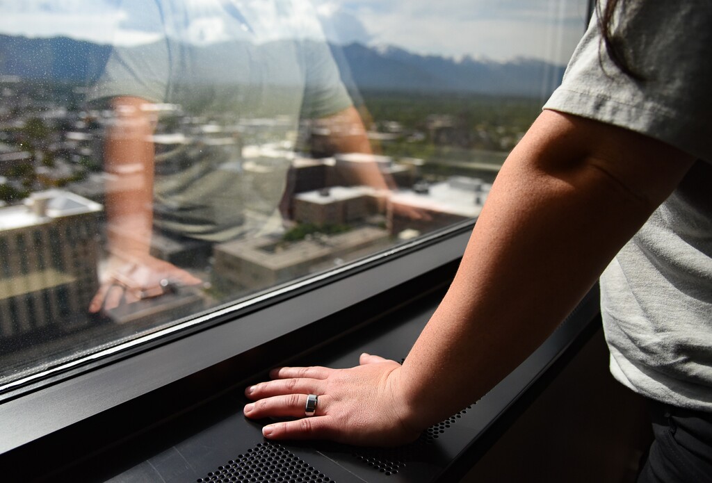 (Francisco Kjolseth  |  The Salt Lake Tribune)  Within hours of meeting her assigned instructor with C.R. England Trucking, he took her to his truck in West Valley City and violently raped her. This Juab County woman is now suing, saying the trucking company didn't do enough to protect her and harassed her after the sexual assault with phone calls, emails and texts insisting that she either come back to training or pay back her tuition. Following a sit down interview at her lawyers's office, she looks out onto the Salt Lake Valley on Monday, June 17, 2019. 