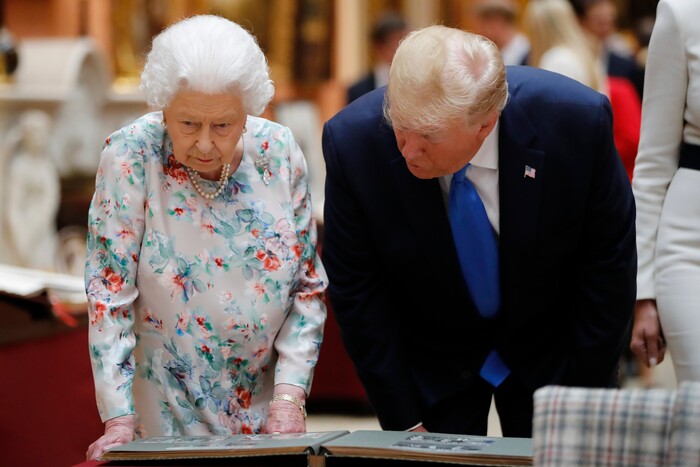 Britain's Queen Elizabeth speaks to U.S President Donald Trump as they view U.S memorabilia from the Royal Collection, at Buckingham Palace, London, Monday, June 3, 2019. Trump is on a three-day state visit to Britain. (Tolga Akmen/Pool Photo via AP)