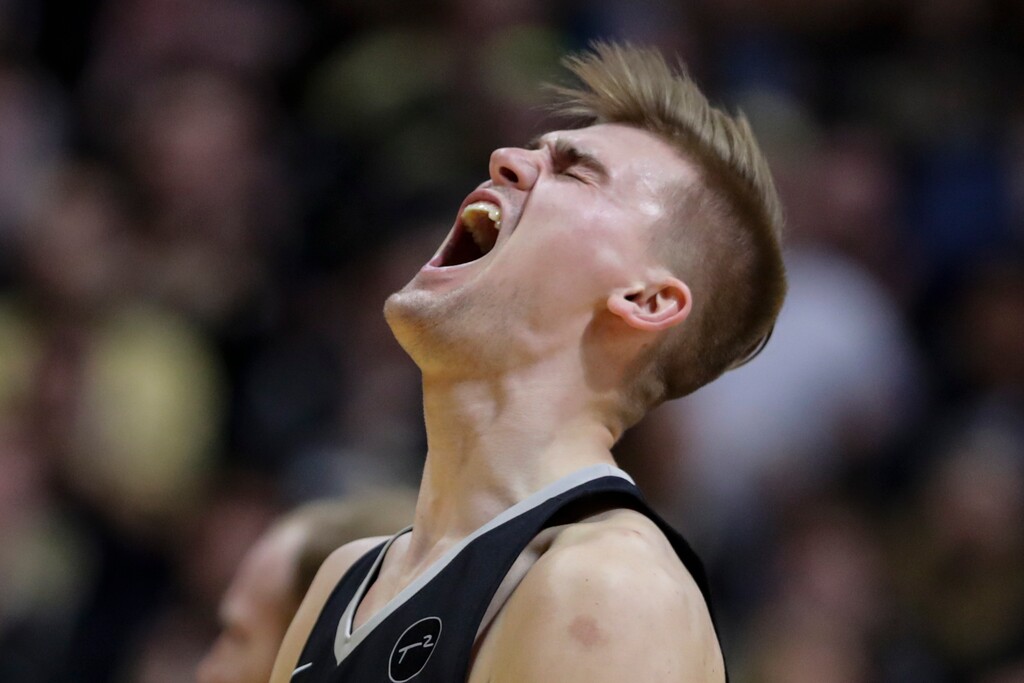 Purdue center Matt Haarms (32) celebrates a basket against Wisconsin during the second half of an NCAA college basketball game in West Lafayette, Ind., Friday, Jan. 24, 2020. (AP Photo/Michael Conroy)
