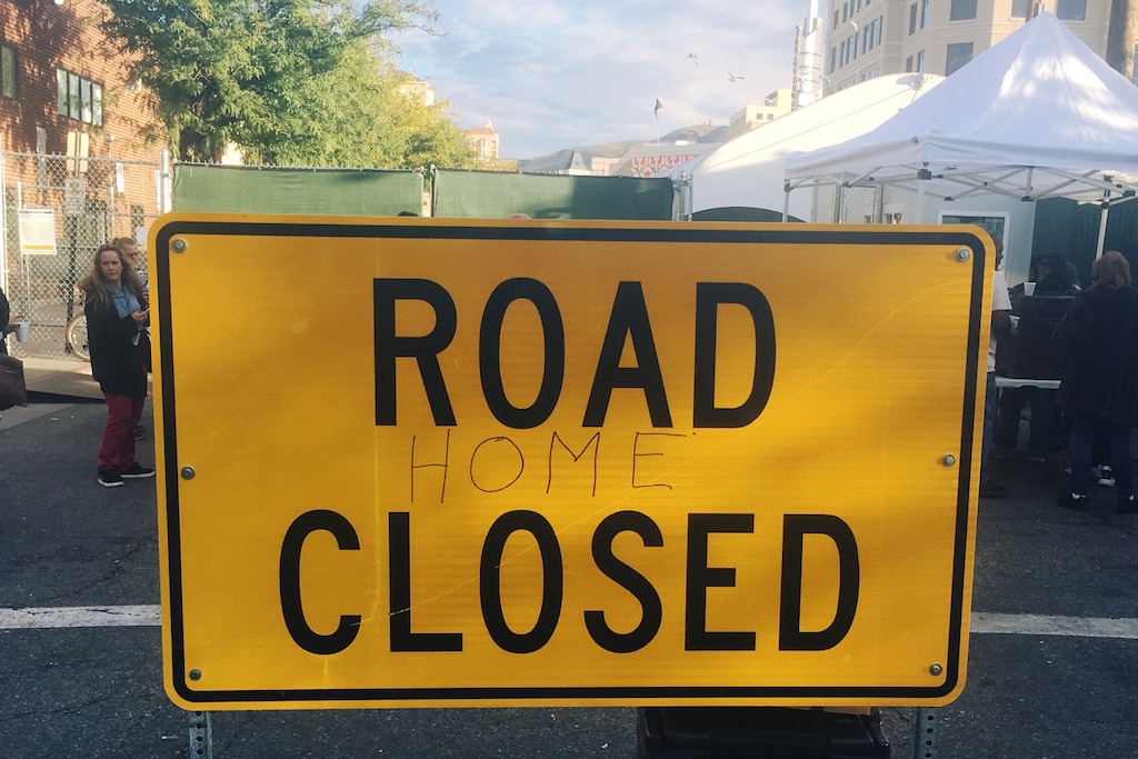 (Jeremy Harmon  |  The Salt Lake Tribune) A sign outside the Road Home has been modified to say "Road Home closed" in this photo from Oct. 9, 2018.