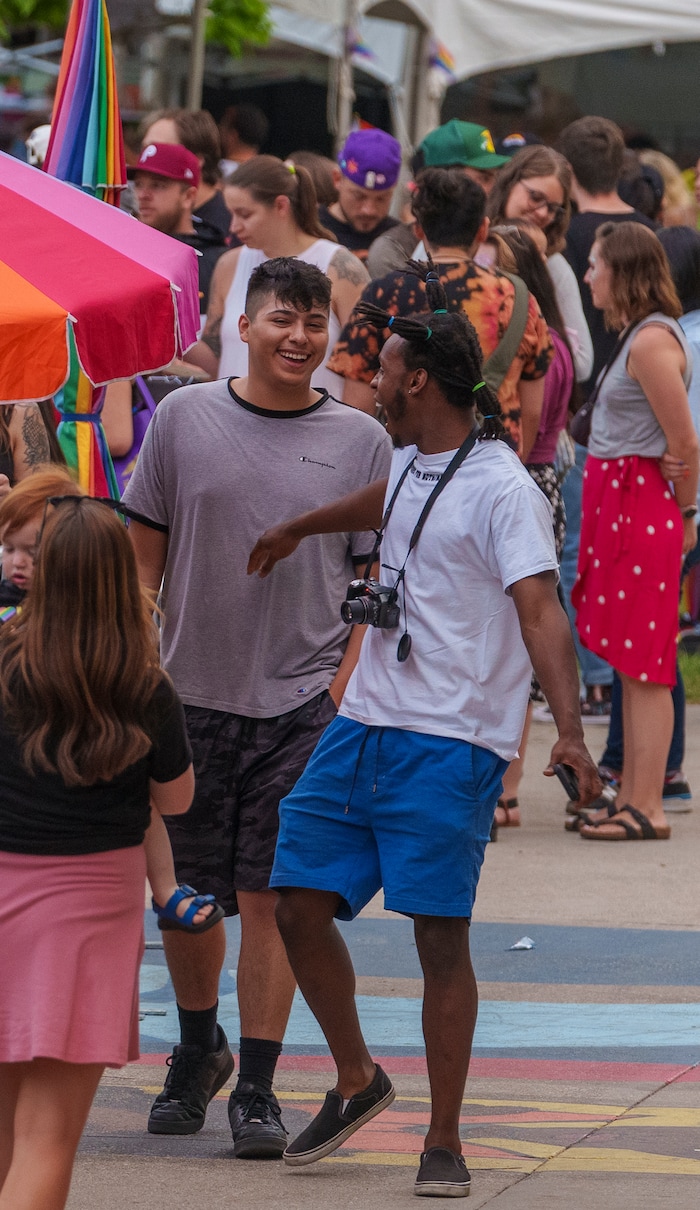 (Leah Hogsten | The Salt Lake Tribune)  Pride festival revelers enjoy the Utah Pride Festival at Washington Square, Saturday, June 4, 2022. 