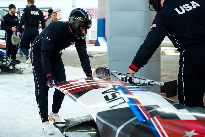 (Chris Detrick  |  The Salt Lake Tribune)  USA's Chris Fogt, left, and Carlo Valdes get the sled off of the track after the 4-man Official Training at Olympic Sliding Centre during the Pyeongchang 2018 Winter Olympics Wednesday, Feb. 21, 2018. 