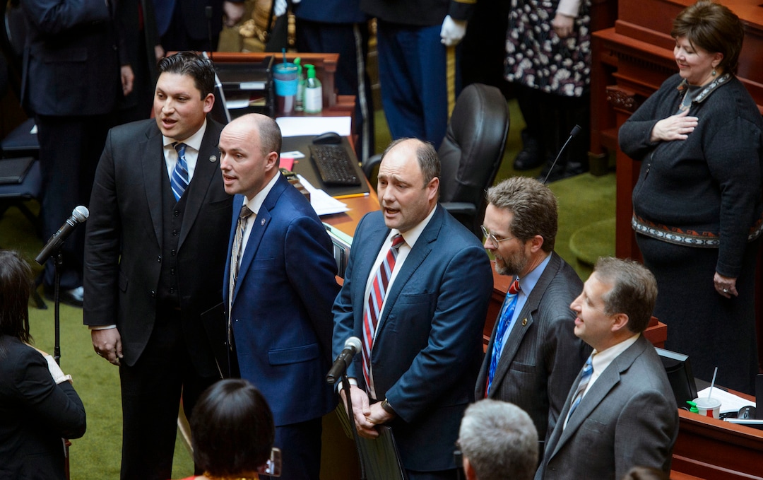 (Steve Griffin  |  The Salt Lake Tribune) Utah Lt. Gov. Spencer Cox, second from left, and former members of the House of Representatives sing the National Anthem as they open the 2018 Legislative session at the Utah State Capitol in Salt Lake City Monday January 22, 2018.