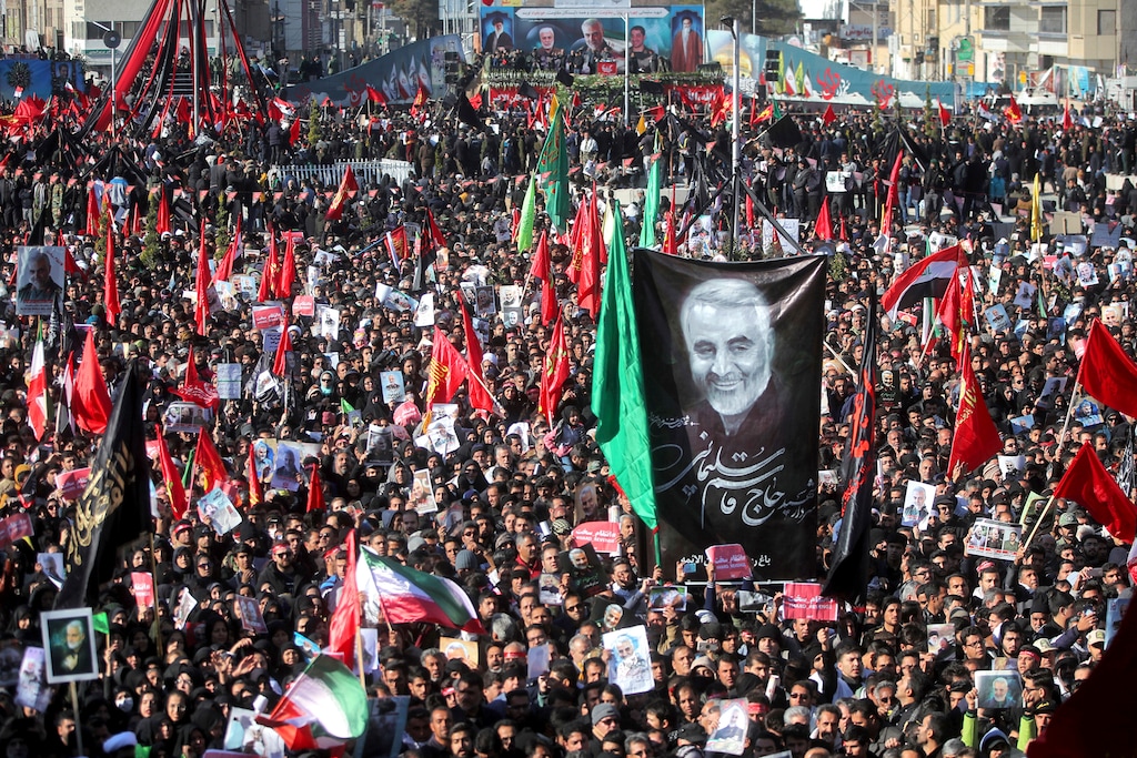 (Erfan Kouchari | Tasnim News Agency via AP) Mourners attend a funeral ceremony for Iranian Gen. Qassem Soleimani and his comrades, who were killed in Iraq in a U.S. drone strike on Friday, in the city of Kerman, Iran, Tuesday, Jan. 7, 2020. The leader of Iran's Revolutionary Guard threatened on Tuesday to "set ablaze" places supported by the United States over the killing of a top Iranian general in a U.S. airstrike last week, sparking cries from the crowd of supporters of "Death to Israel!"