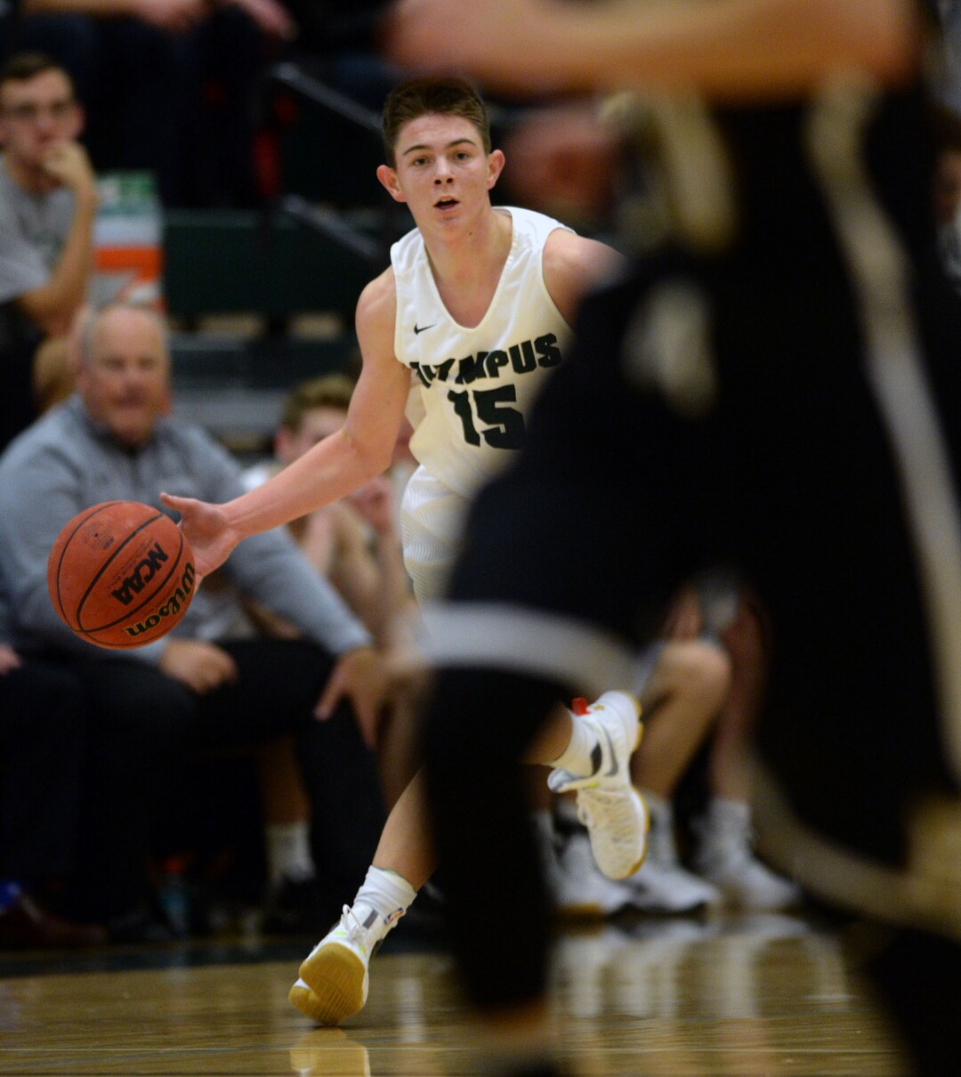 Steve Griffin / The Salt Lake TribuneOlympus guard Rylan Jones drives the ball up court  during game at Olympus High School in Salt Lake City Tuesday December 20, 2016. 