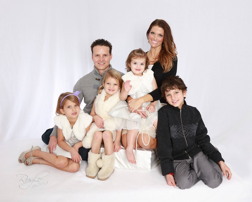 (Courtesy Corrine Stokoe) David Stokoe poses for a portrait with his wife, Nikki, and their four children.