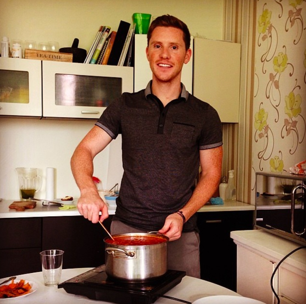 (Max Gor) Eli McCann makes a Ukrainian borscht at a friend's apartment in Kyiv.