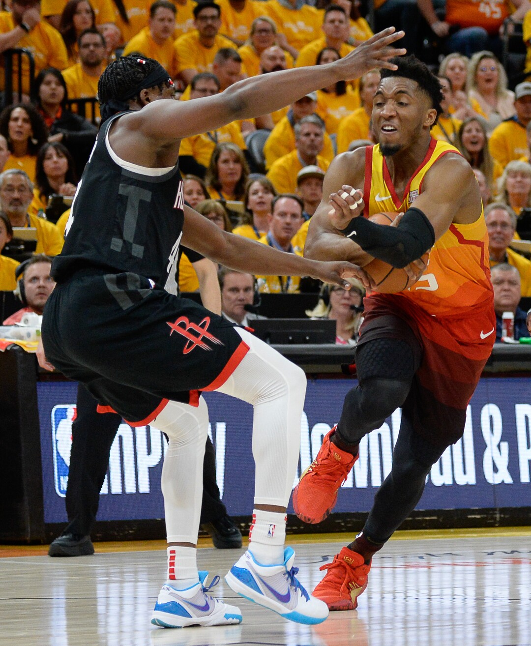 (Francisco Kjolseth  |  The Salt Lake Tribune)  Utah Jazz guard Donovan Mitchell (45) pushes past the Rockets in Game 3 of a first-round NBA basketball playoff series in Salt Lake City, Saturday, April 20, 2019.
