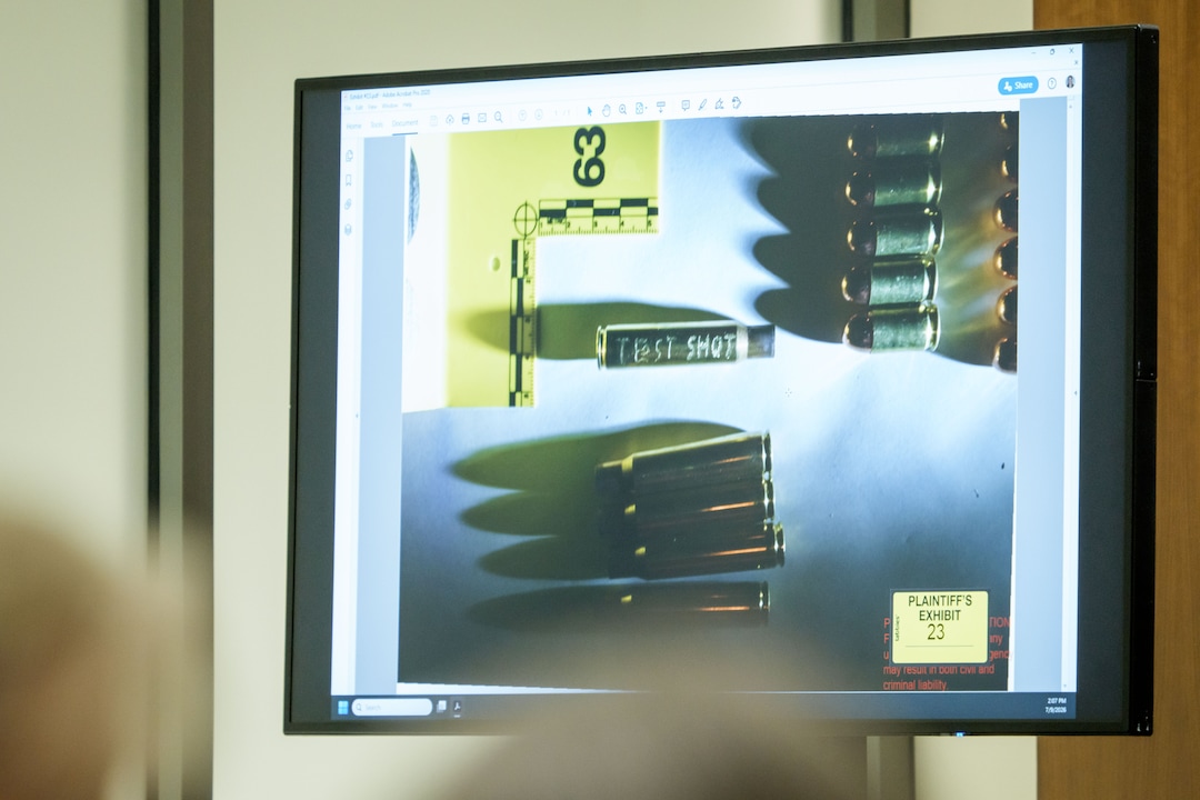 (Spenser Heaps | Pool) An image that shows ammunition, including a casing engraved with the words “TEST SHOT” is displayed during a preliminary hearing for Tyler Robinson, who is accused in the fatal shooting of Charlie Kirk, at the Fourth District Courthouse in Provo, Thursday, July 9, 2026.