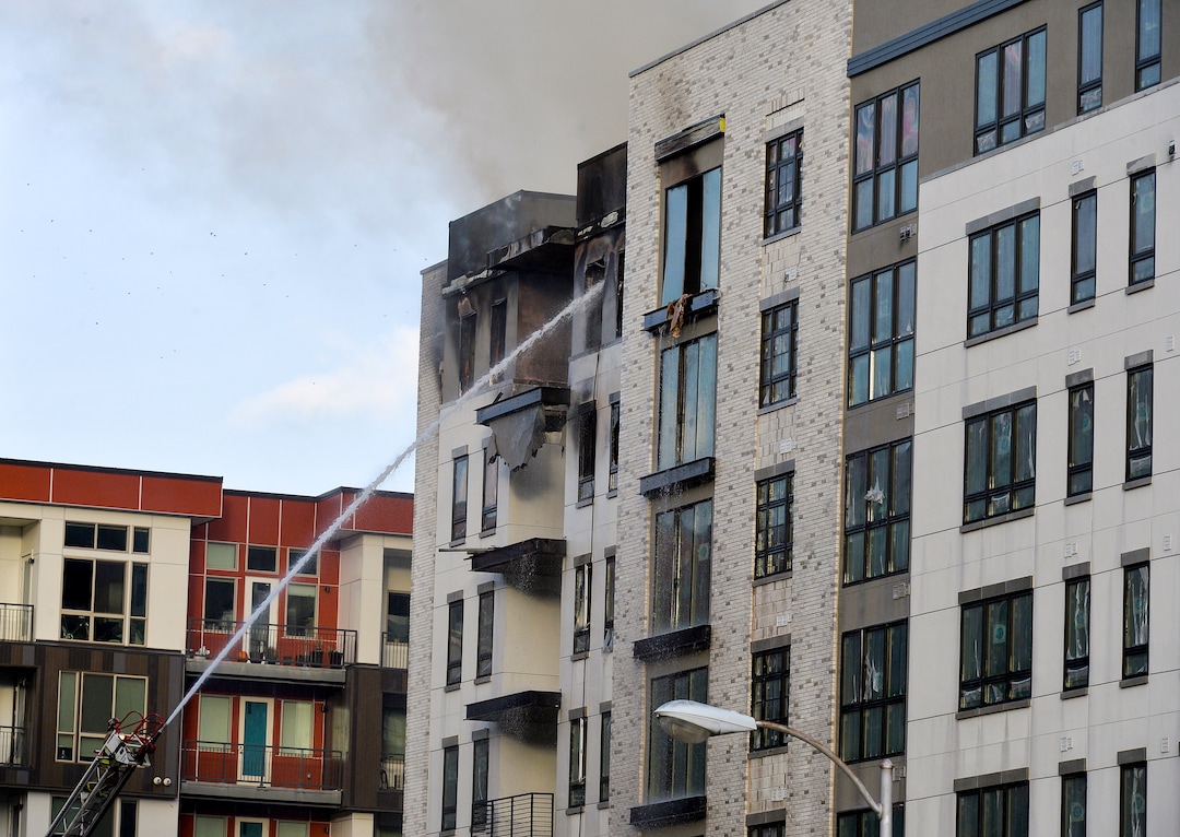 (Chris Samuels | The Salt Lake Tribune) Emergency crews continue to respond to a four-alarm fire in a new construction of apartment residences in Sugar House, Wednesday, Oct. 26, 2022.