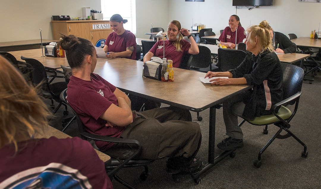 (Leah Hogsten  |  The Salt Lake Tribune) "We talk about teamwork, being a team player," said Carolyn Price of her charges. Every week, Price and her staff of eight inmates, who are proud to be in the program, hold a safety meeting after serving breakfast and lunch to discuss what went well in the past week and what needs improvement.  Every Monday through Friday, a half-dozen or so Level 4 inmates file out of the Olympus Facility at the Utah State Prison to cook, bake and serve the public at the Serving Time Caf. The operation is part of Utah Department of Corrections Industries (UCI) and is aimed at helping inmates return to society.