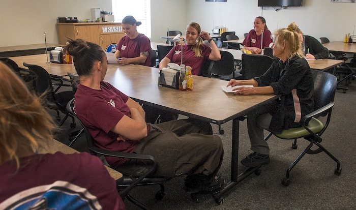 (Leah Hogsten  |  The Salt Lake Tribune) "We talk about teamwork, being a team player," said Carolyn Price of her charges. Every week, Price and her staff of eight inmates, who are proud to be in the program, hold a safety meeting after serving breakfast and lunch to discuss what went well in the past week and what needs improvement.  Every Monday through Friday, a half-dozen or so Level 4 inmates file out of the Olympus Facility at the Utah State Prison to cook, bake and serve the public at the Serving Time Caf. The operation is part of Utah Department of Corrections Industries (UCI) and is aimed at helping inmates return to society.
