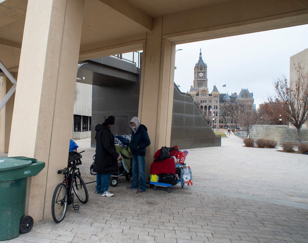 (Rick Egan | The Salt Lake Tribune) People are forced to pack up their belongings in carts near the Salt Lake City Library, Monday, Dec. 23, 2019.