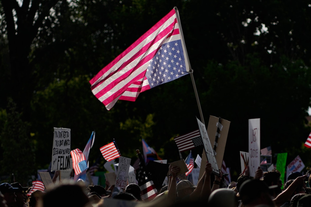 (Francisco Kjolseth  | The Salt Lake Tribune) People gather for a No Kings demonstration in downtown Salt Lake City on Saturday, June 14, 2025.