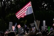 (Francisco Kjolseth  | The Salt Lake Tribune) People gather for a No Kings demonstration in downtown Salt Lake City on Saturday, June 14, 2025.