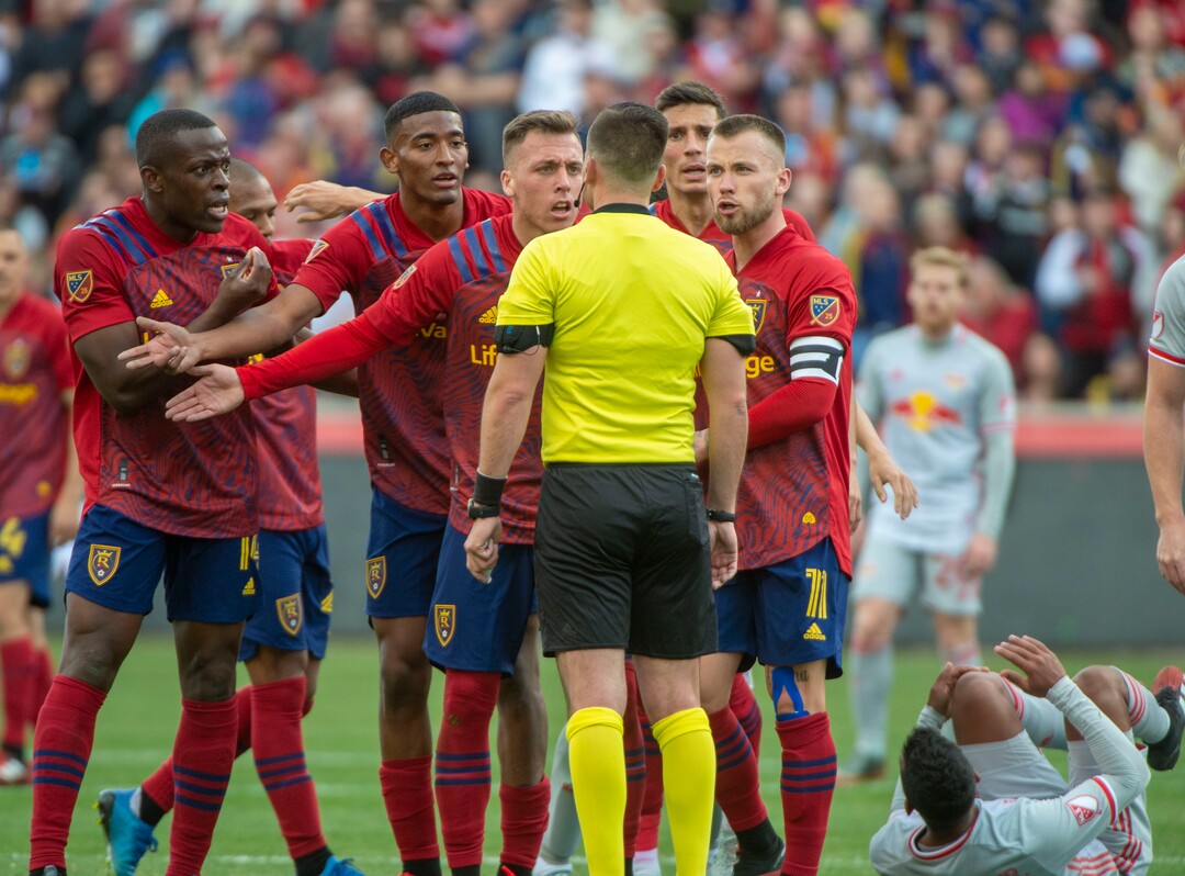 (Rick Egan  |  The Salt Lake Tribune)   Real Salt Lake plead with the official, as New York Red Bulls midfielder Cristian Casseres Jr (23) takes his time getting up, in MLS acton between Real Salt Lake and the New York Red Bulls at Rio Tinto Stadium, Saturday, March 7, 2020.