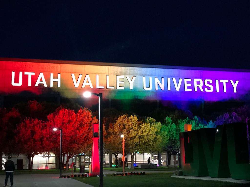 (Photo courtesy of Emily Branvold) Pictured is the UCCU Center at Utah Valley University lit up in rainbow colors for an LGBTQ graduation celebration for 2021.