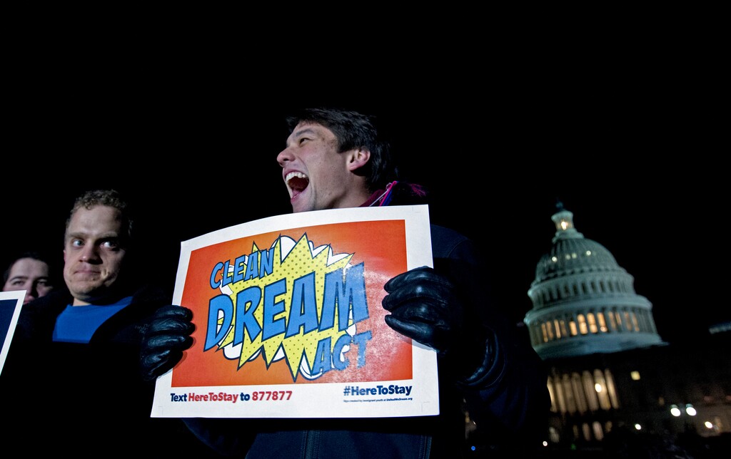 Demonstrators rally in support of the Deferred Action for Childhood Arrivals (DACA), and to avoid the government shut down on Capitol Hill, Friday, Jan. 19, 2018, in Washington. ( AP Photo/Jose Luis Magana)