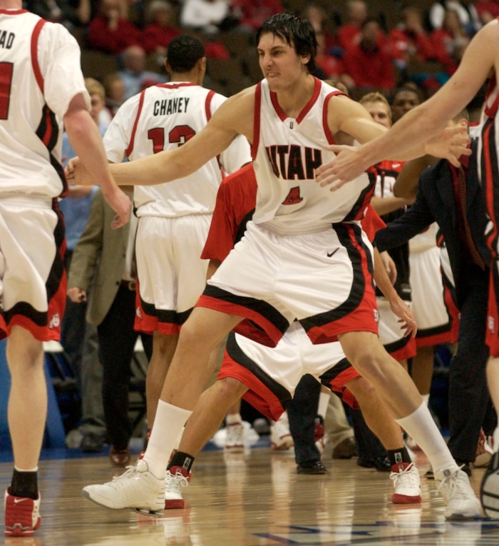 Andrew Bogut runs unto the court to congratulate his teammates after Jonas Langvad's three pointer forced UNLV to call a timeout during first half action in the Utah UNLV men's basketball game at the Pepsi Center in Denver March 11., 2005 3/11/05 Griffin/photo