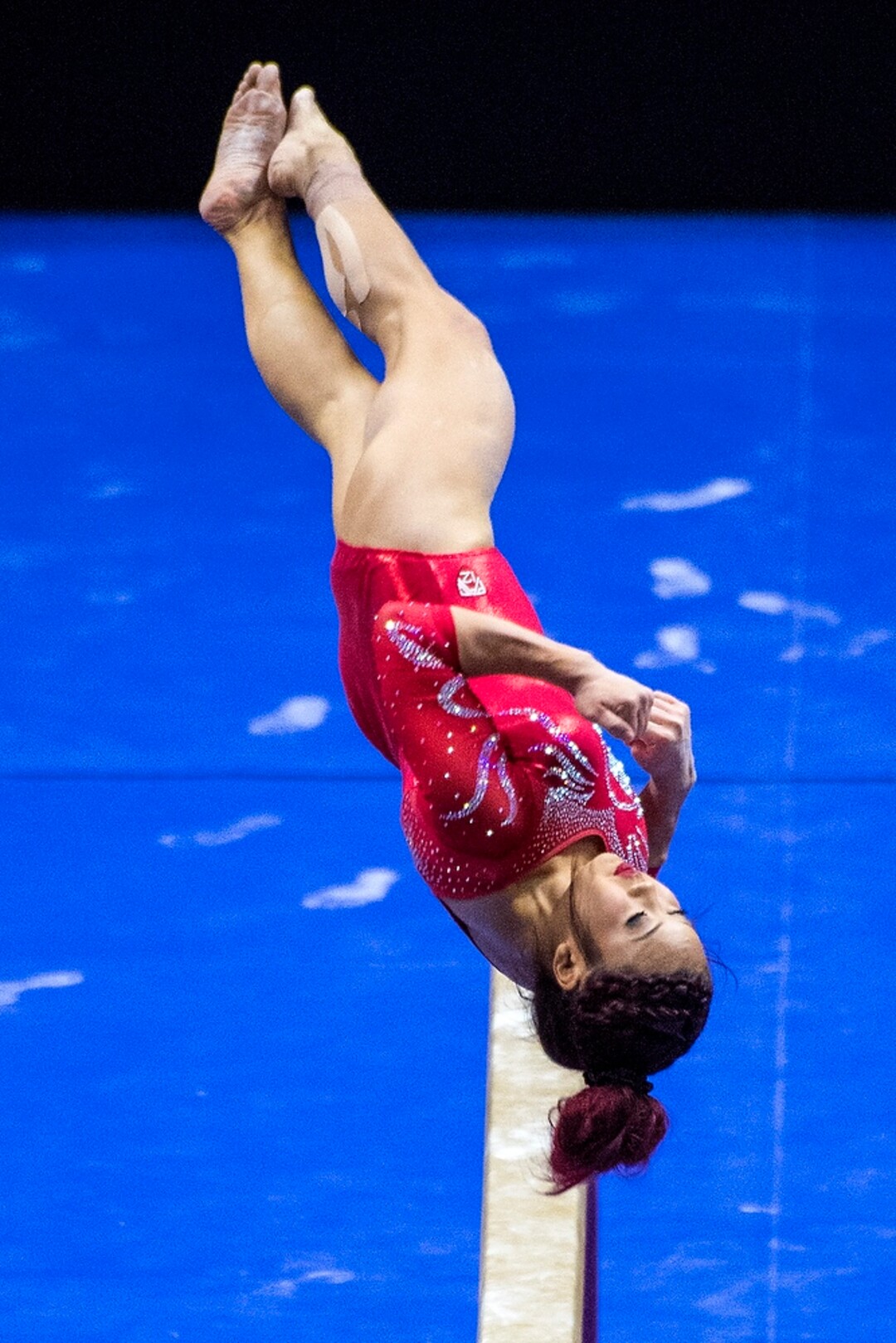 (Chris Detrick  |  The Salt Lake Tribune)  Utah's Kari Lee competes on the beam during the gymnastics meet against Brigham Young University Friday, January 5, 2018.  