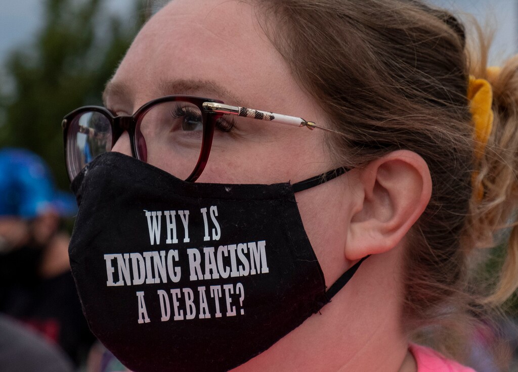 (Leah Hogsten  |  The Salt Lake Tribune) Jessy Salas with Black Lives for Humanity sports a handmade mask from the Mayes family. Black Lives Matter supporters and Salt Lake Equal Rights Movement members march from the Capitol to Washington Square on Monday, August 31, 2020 calling for justice for Jacob Blake who was shot in the back by police in Kenosha, Wisconsin on August 23rd.