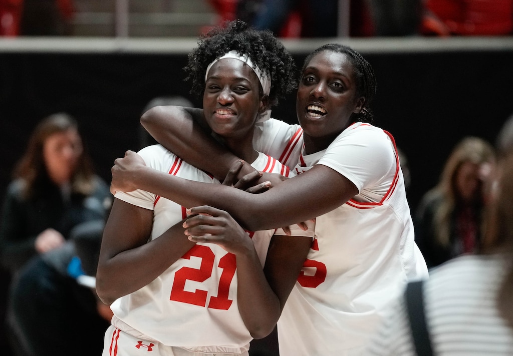 (Francisco Kjolseth  | The Salt Lake Tribune) Utah Utes forward Maye Toure (21) and Utah Utes center Nene Sow (25) celebrate their 69-42 win over Houston, NCAA basketball in Salt Lake City on Saturday, Jan. 11, 2025.
