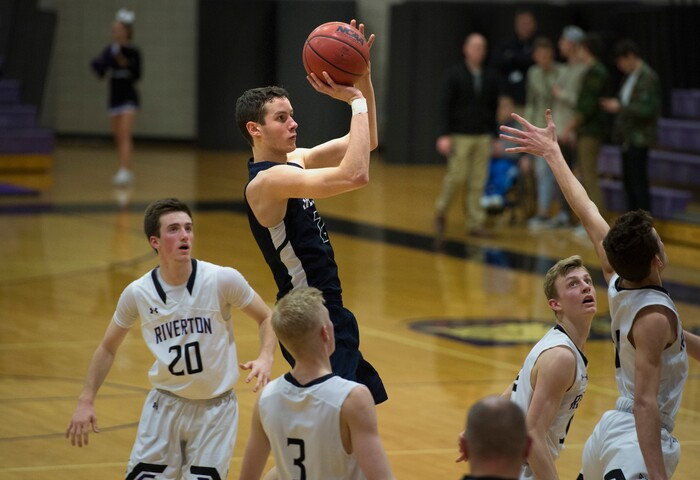 Scott Sommerdorf | The Salt Lake TribuneCopper Hills's Isaac Flores takes a calm jumper during second half play. Copper Hills defeated Riverton 54-50, Friday, February, 2, 2018. 