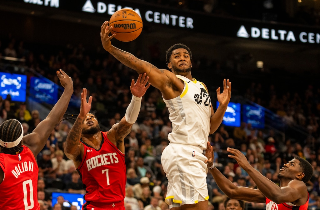 (Rick Egan | The Salt Lake Tribune) Utah Jazz forward Brice Sensabaugh (28) grabs a rebound from Houston Rockets guard Aaron Holiday (0) and  forward Cam Whitmore (7), in NBA preseason action between the Utah Jazz and the Houston Rockets, at the Delta Center, on Monday, Oct. 7, 2024.