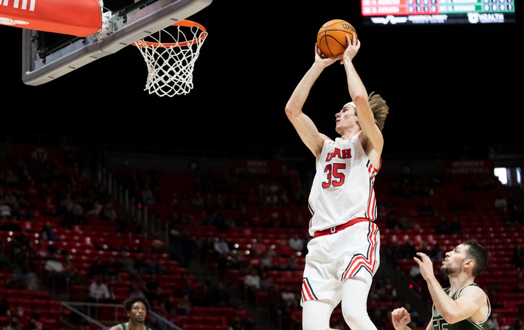(Rick Egan | The Salt Lake Tribune) Utah Utes center Branden Carlson (35) shoots the ball in the Utes 96-62 win over the Manhattan Jaspers at the Jon M.Huntsman Center, on Saturday, December 11, 2021.