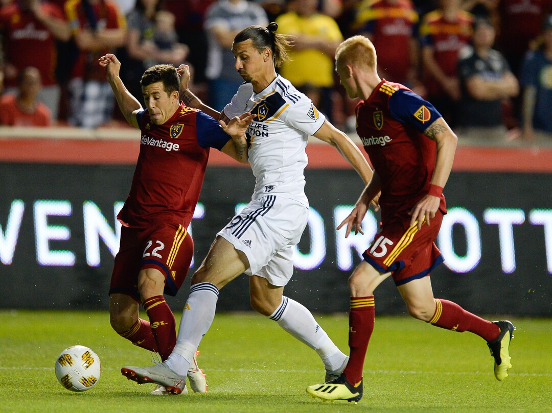 (Francisco Kjolseth  |  The Salt Lake Tribune)  Los Angeles Galaxy forward Zlatan Ibrahimovic (9) gets heavy pressure from RSL during the first half of the MLS soccer match Saturday, Sept. 1, 2018, in Sandy at Rio Tinto Stadium.