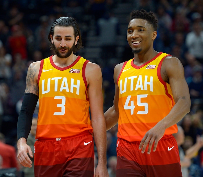 (Steve Griffin  |  The Salt Lake Tribune) Utah Jazz guard Ricky Rubio (3) and Utah Jazz guard Donovan Mitchell (45) celebrate a victory over the NBA Champion Golden State Warrior at Vivint Smart Home Arena in Salt Lake City Tuesday January 30, 2018.