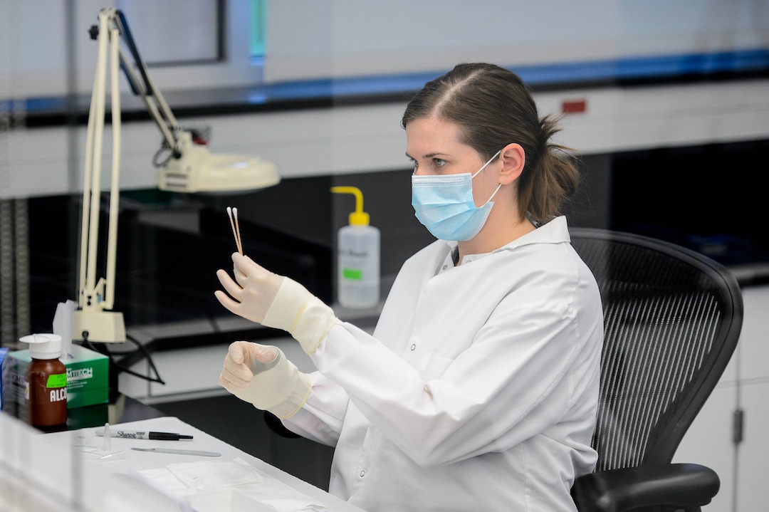 (Trent Nelson  |  The Salt Lake Tribune)  Hannah Bennett, a forensic scientist working in the biology section of the Department of Safety Forensic Services lab, processing evidence from a sexual assault collection kit, in Taylorsville on Tuesday May 7, 2019.