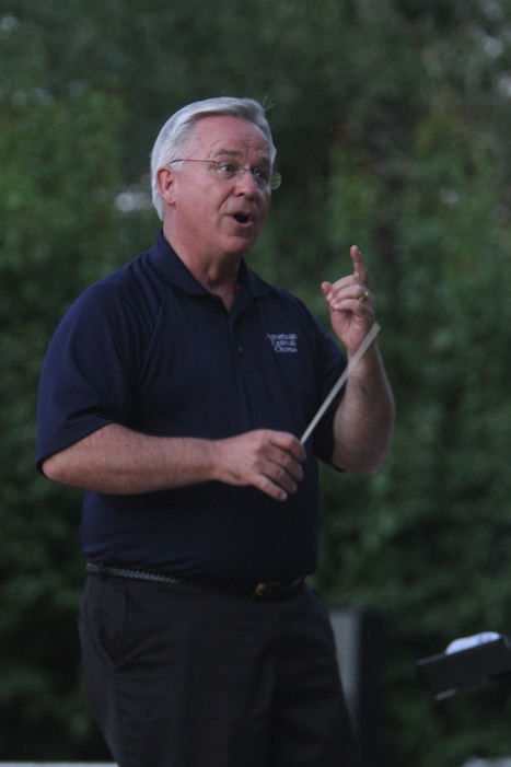 Rick Egan | The Salt Lake Tribune
Craig Jessop conducts the American Festival Chorus during the Canyon Road Memorial Program in Logan, Monday, Sept. 3, 2012.